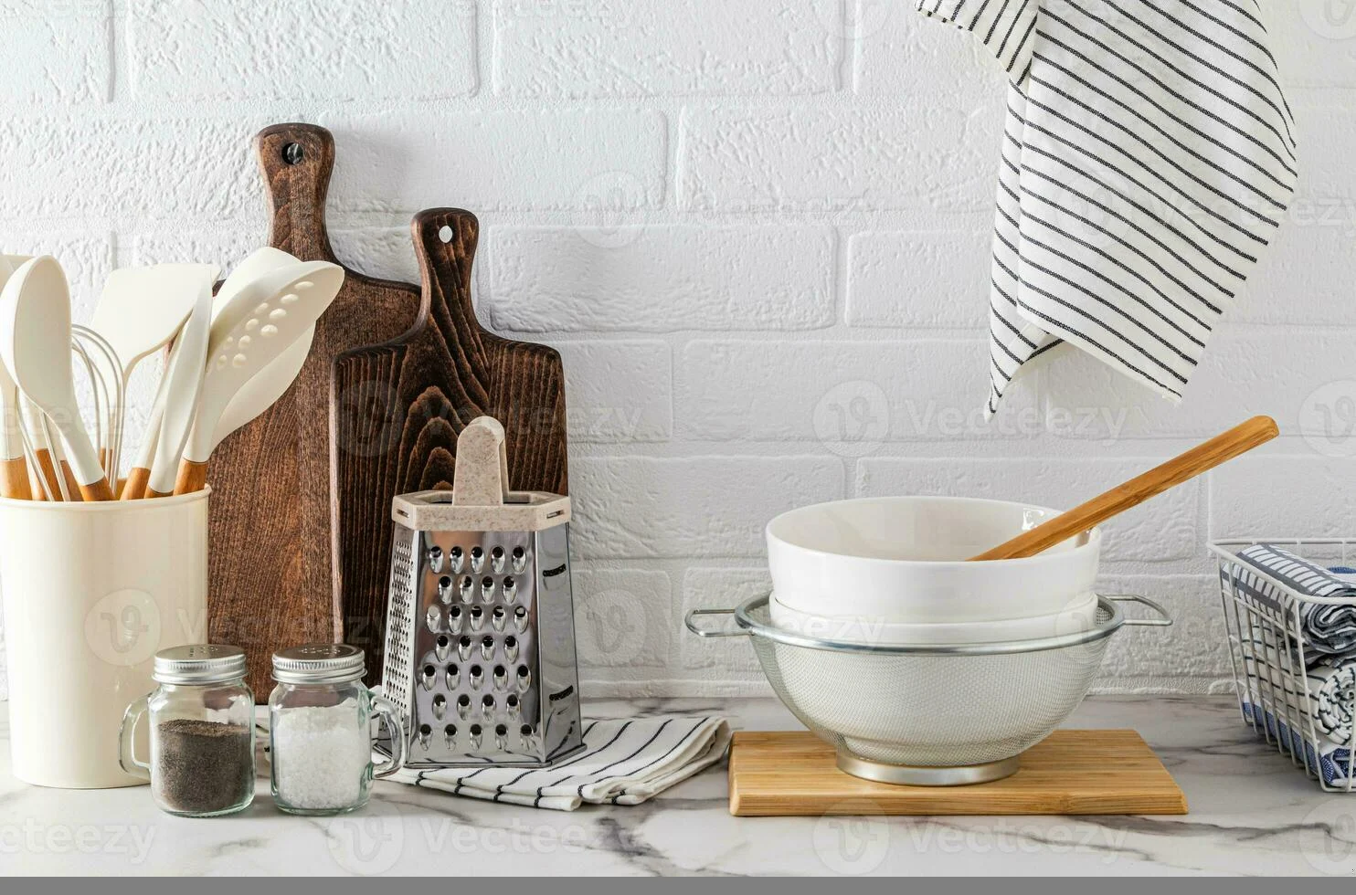 Set of eco-friendly kitchen tools on marble countertop